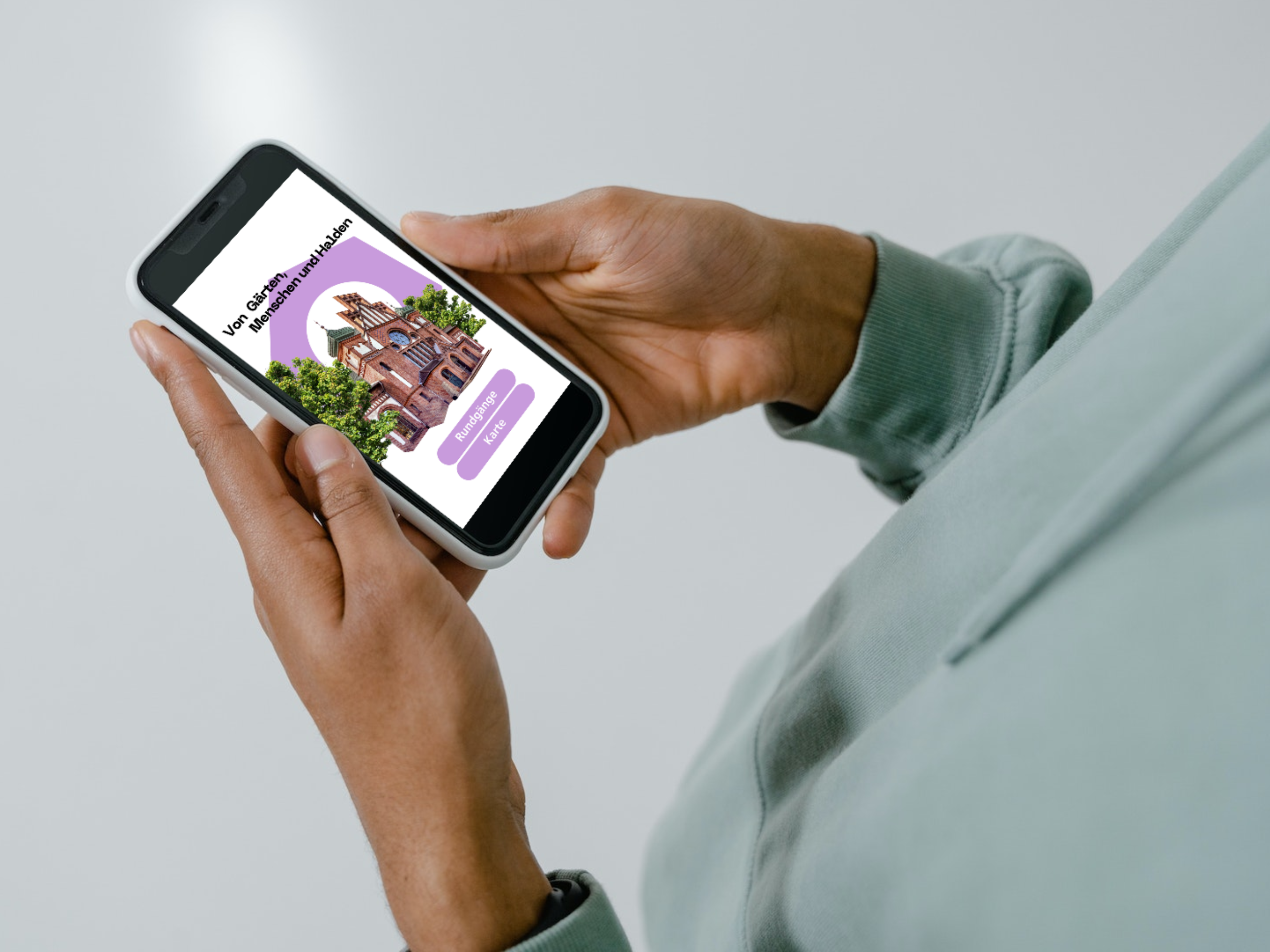 Zwei Hände halten ein Mobiltelefon